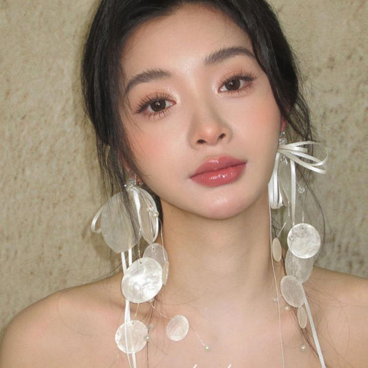 Long earrings with white circular pieces