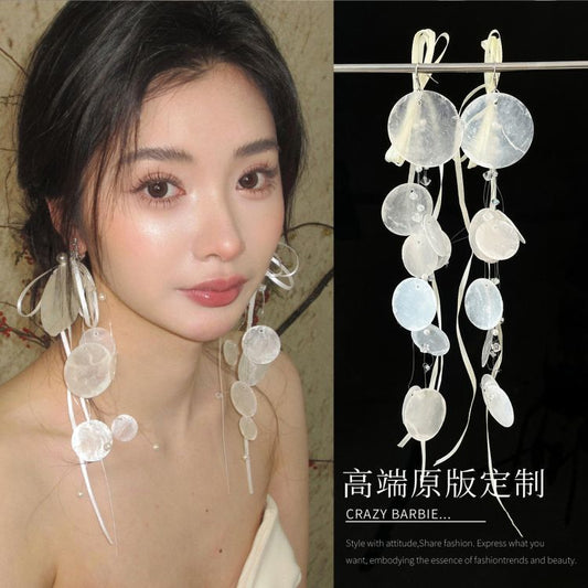 Long earrings with white circular pieces